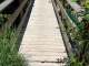 Petit pont qui permet de contourner si le cours d'eau est trop important (photo suivante) (9 juillet 2024)